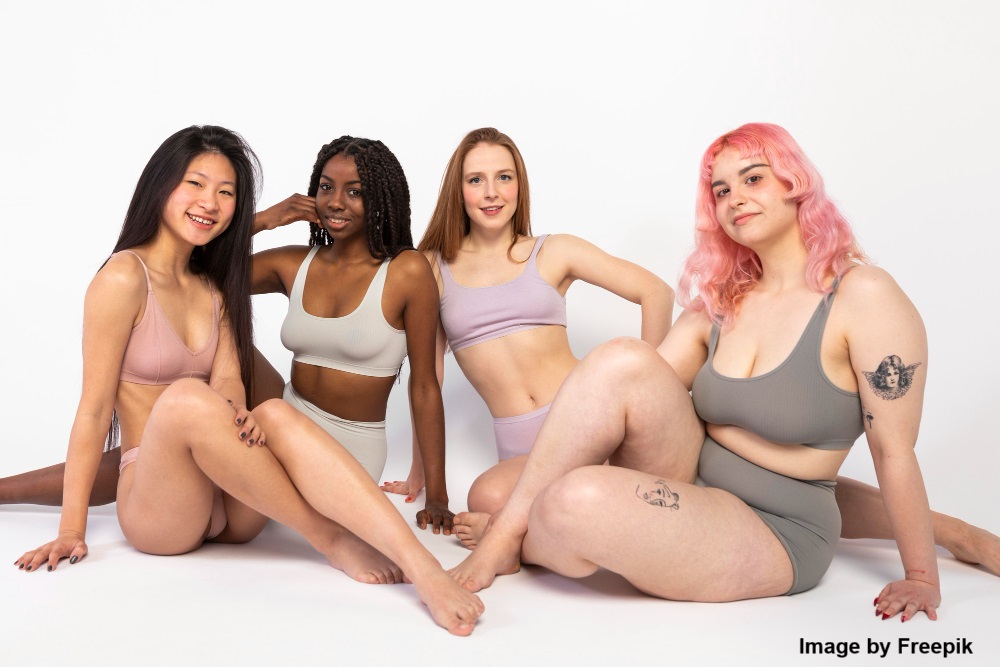 A group of beautiful diverse women showing their different body types.