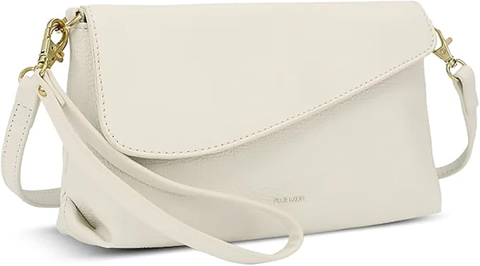 Pixie Mood vegan sustainable leather clutch in soft ivory with a modern envelope flap and detachable wristlet and crossbody straps. This cruelty-free accessory combines minimalist design with sustainable materials, offering versatile wear for day or night.