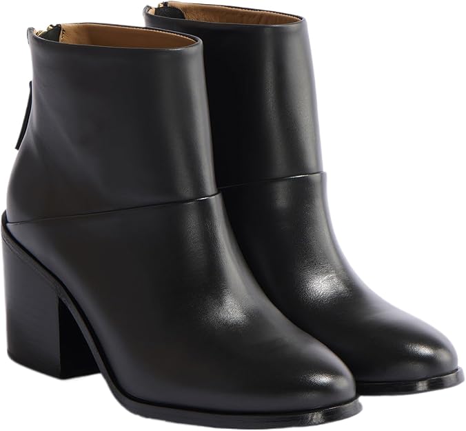 Nisolo black sustainable leather ankle boots with block heel, crafted ethically for timeless style and durability.